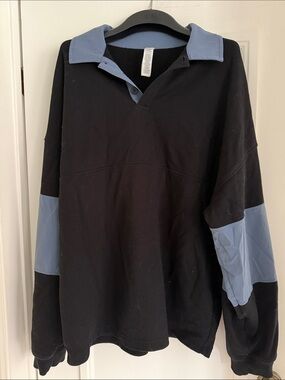 ALO Yoga Black Long-Sleeve Polo with Light Blue Accents